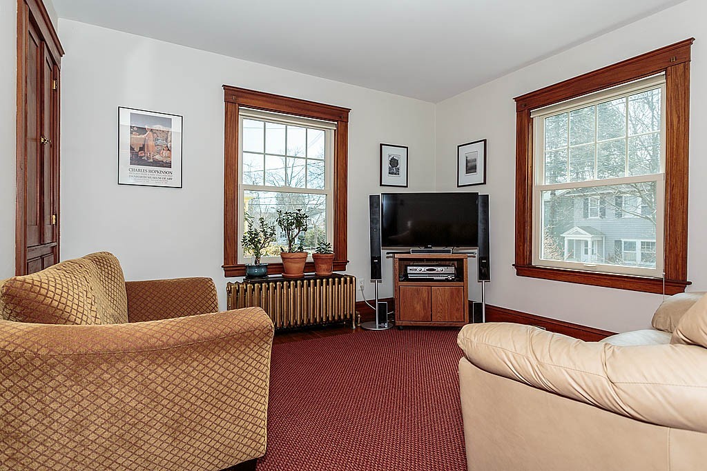29 Ware Road Newton, MA 02466 - Photo 6 of 25 a living room with furniture and a flat screen tv