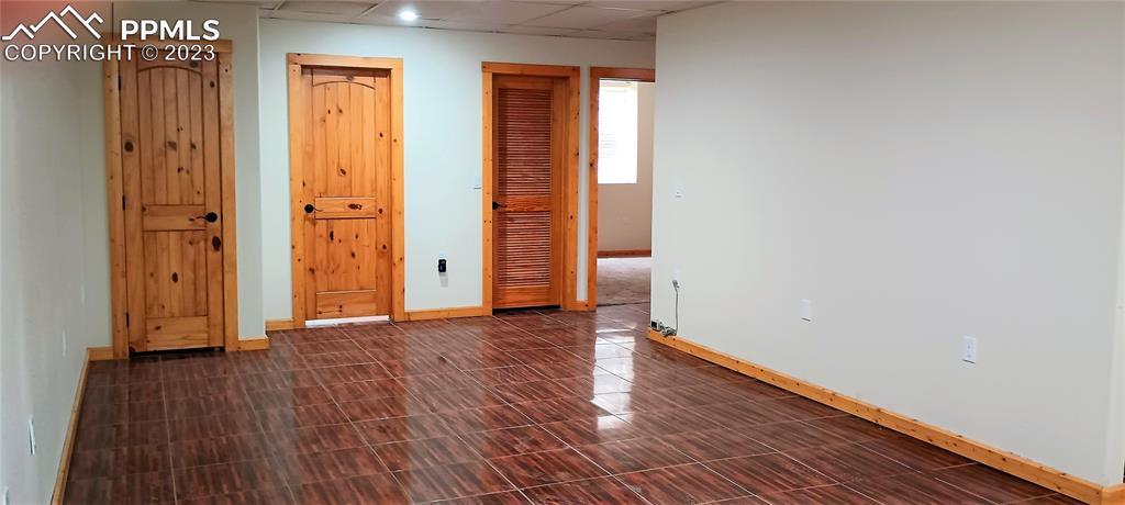1260 County Road South Rush, CO 80833 - Photo 15 of 41 a view of wooden floor in an empty room