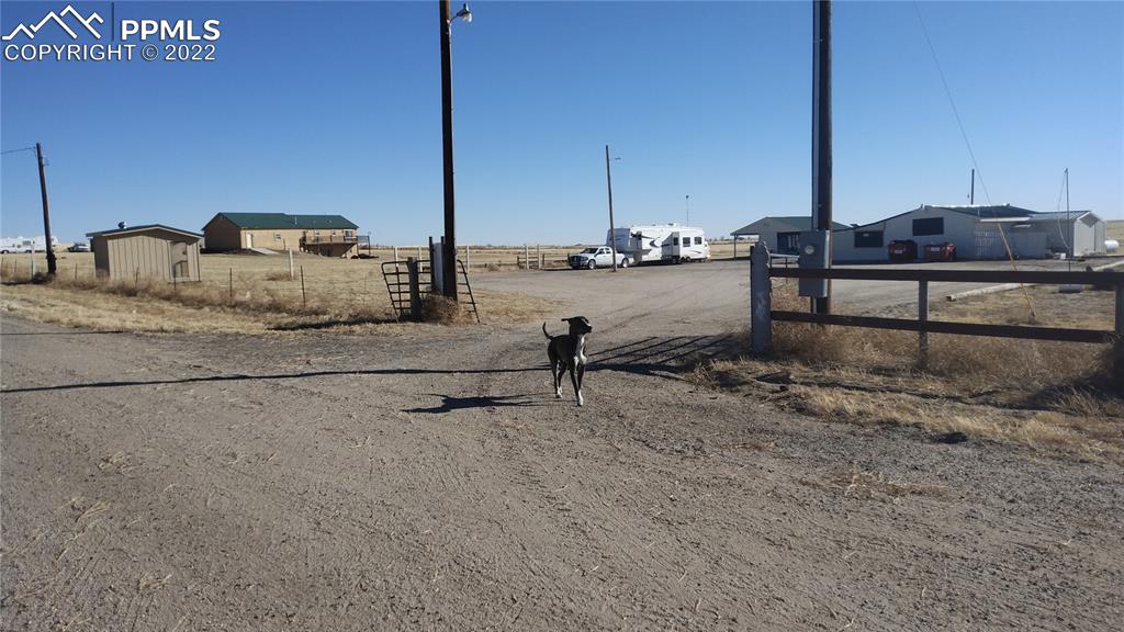1260 County Road South Rush, CO 80833 - Photo 41 of 41 a view of a terrace with lawn chairs