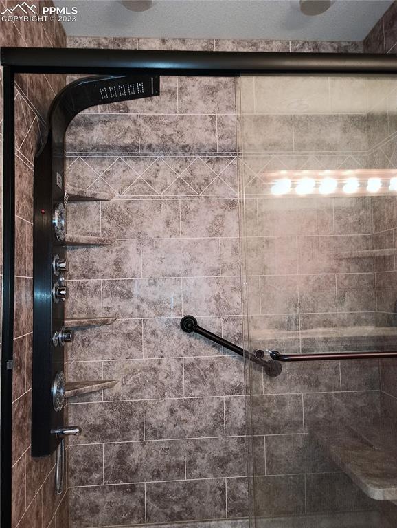 1260 County Road South Rush, CO 80833 - Photo 7 of 41 a close view of a bathtub in a bathroom