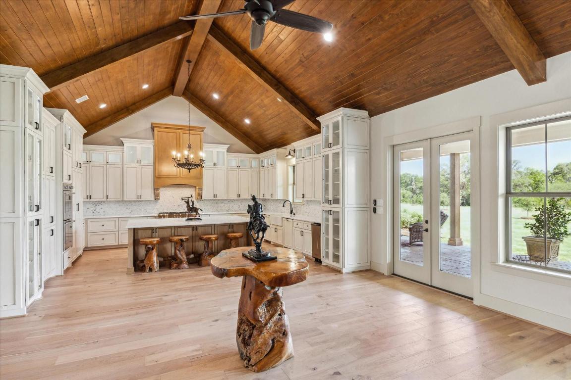 2130 Hartfield Road Round Top, TX 78954 - Photo 14 of 39 a very nice looking living room with a large window and furniture