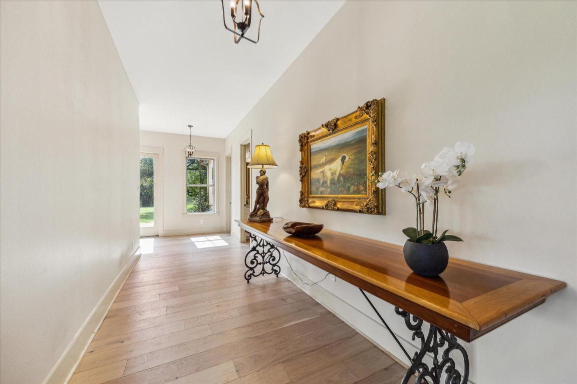 2130 Hartfield Road Round Top, TX 78954 - Photo 15 of 39 a living room with furniture and a potted plant