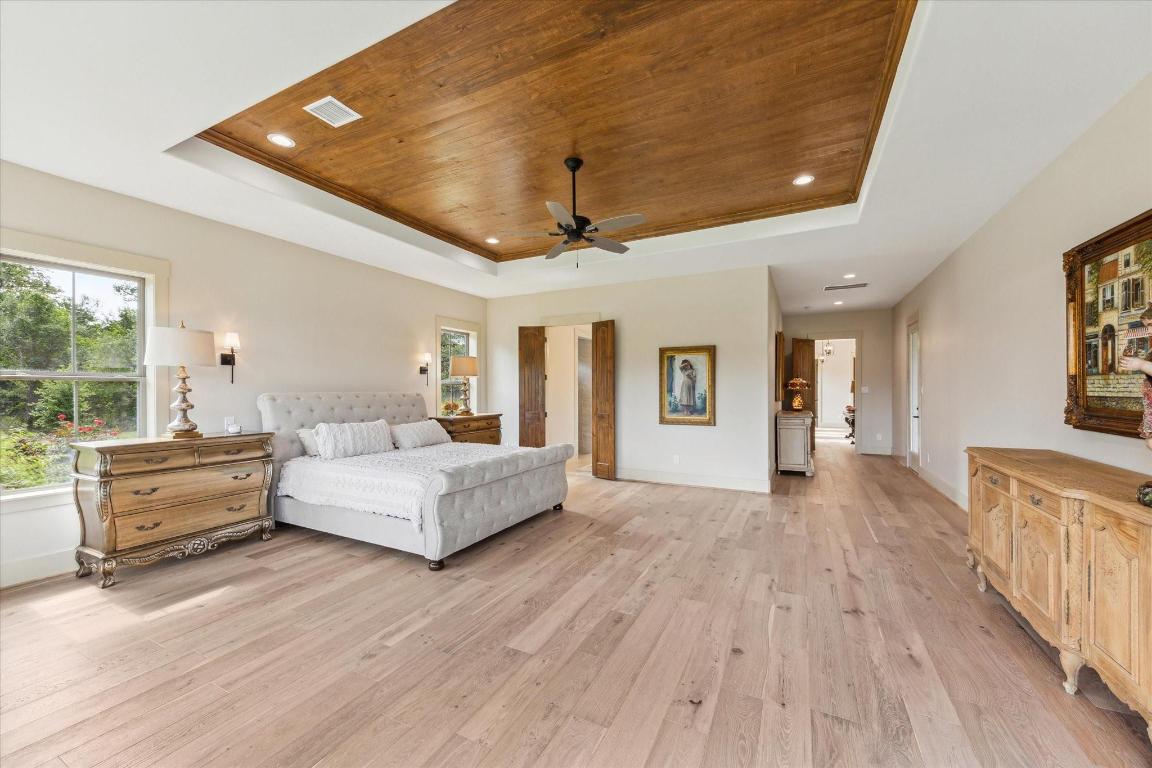 2130 Hartfield Road Round Top, TX 78954 - Photo 22 of 39 a living room with furniture and wooden floor