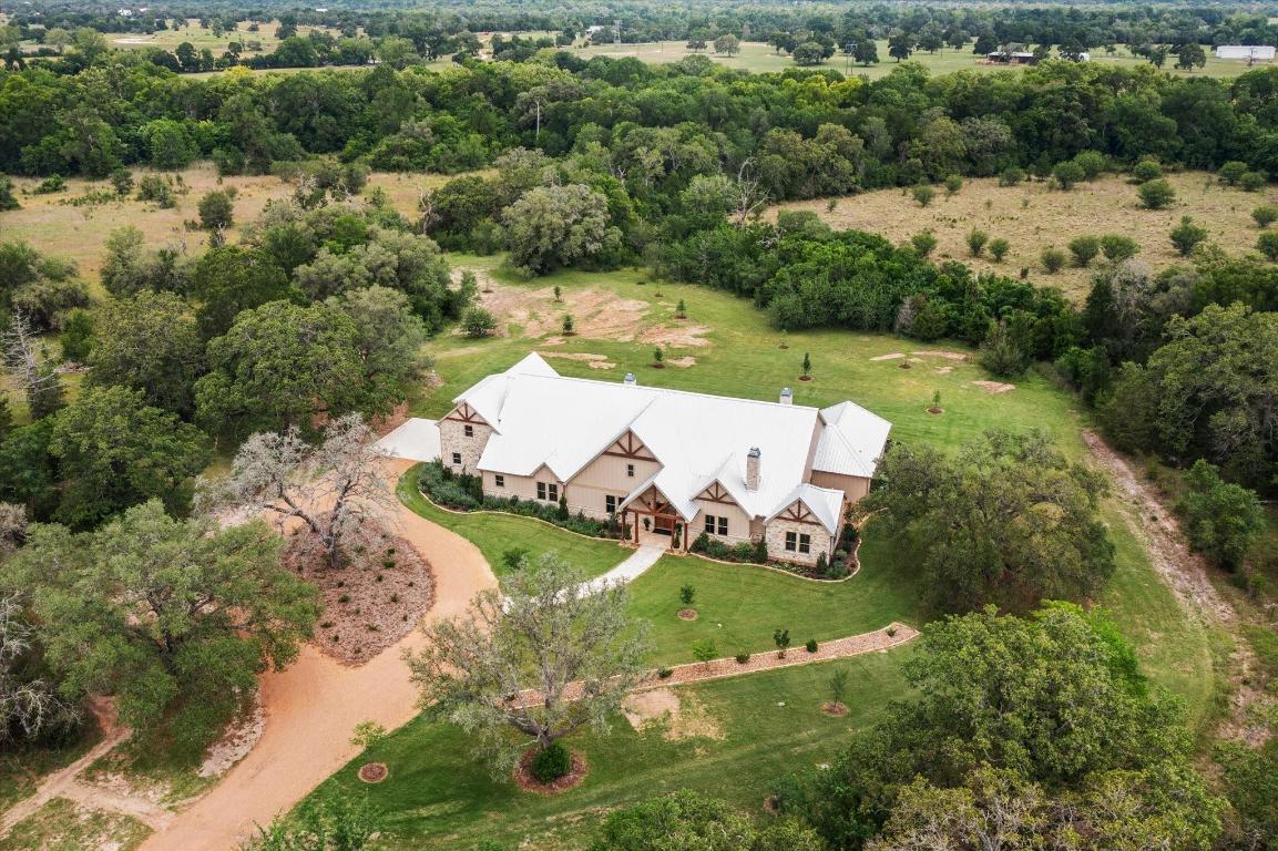 2130 Hartfield Road Round Top, TX 78954 - Photo 39 of 39 an aerial view of a house with yard