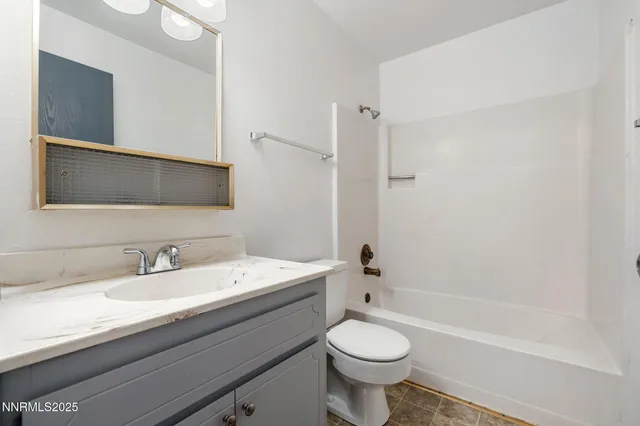 a view of backyard with tub