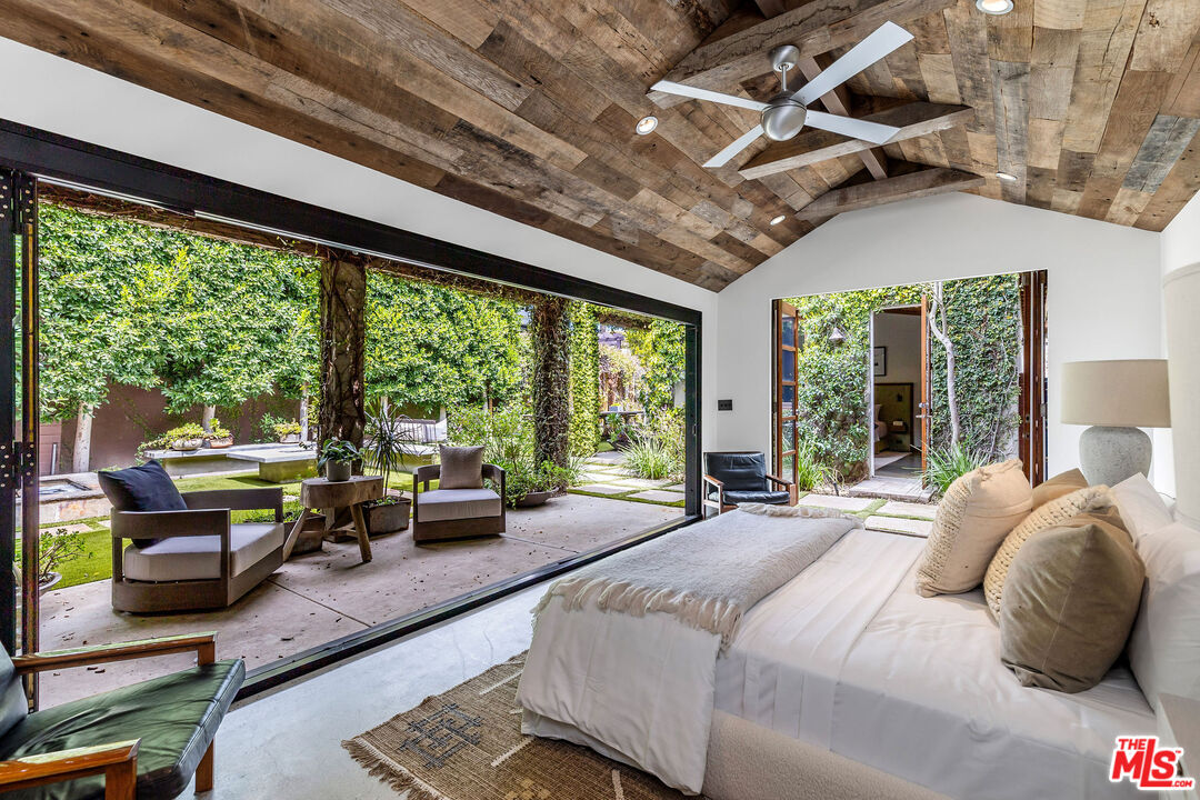 2211 Glencoe Avenue Venice, CA 90291 - Photo 14 of 19 a bedroom with furniture and a large window