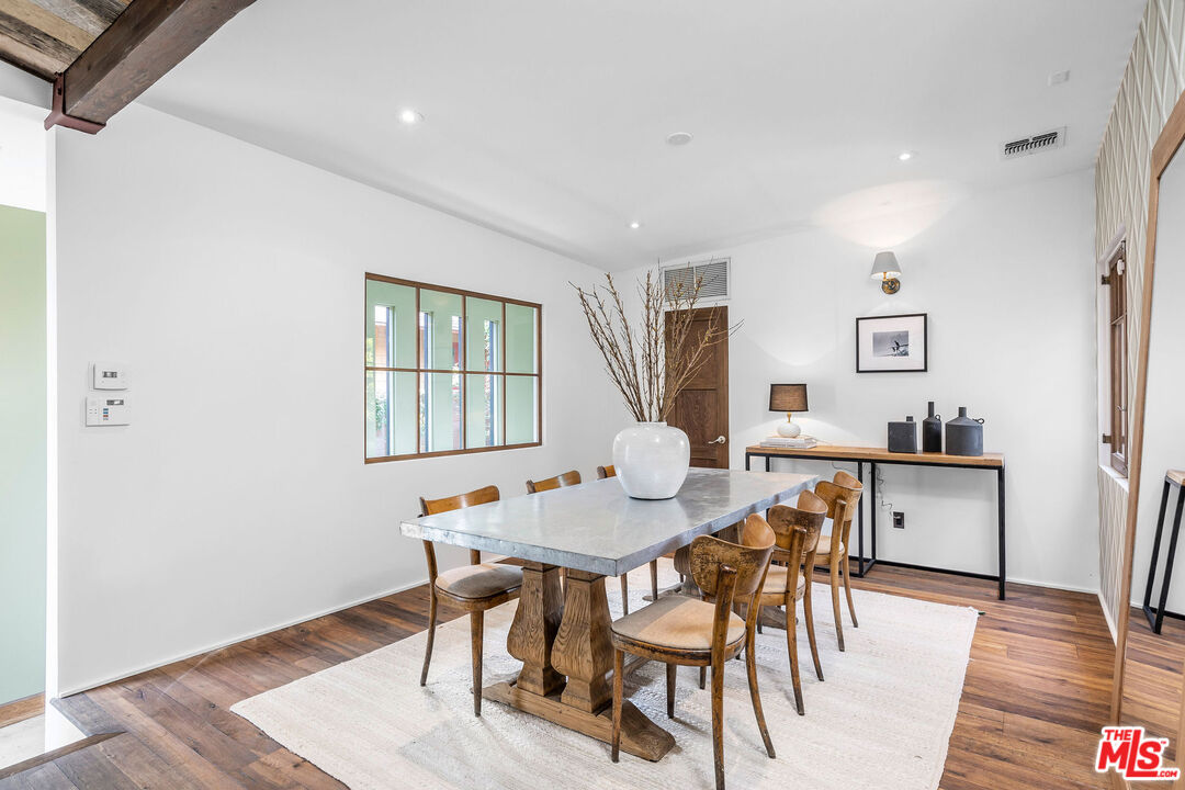 2211 Glencoe Avenue Venice, CA 90291 - Photo 5 of 19 a view of a dining room with furniture and wooden floor