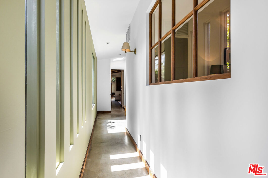 2211 Glencoe Avenue Venice, CA 90291 - Photo 7 of 19 a view of a hallway with windows