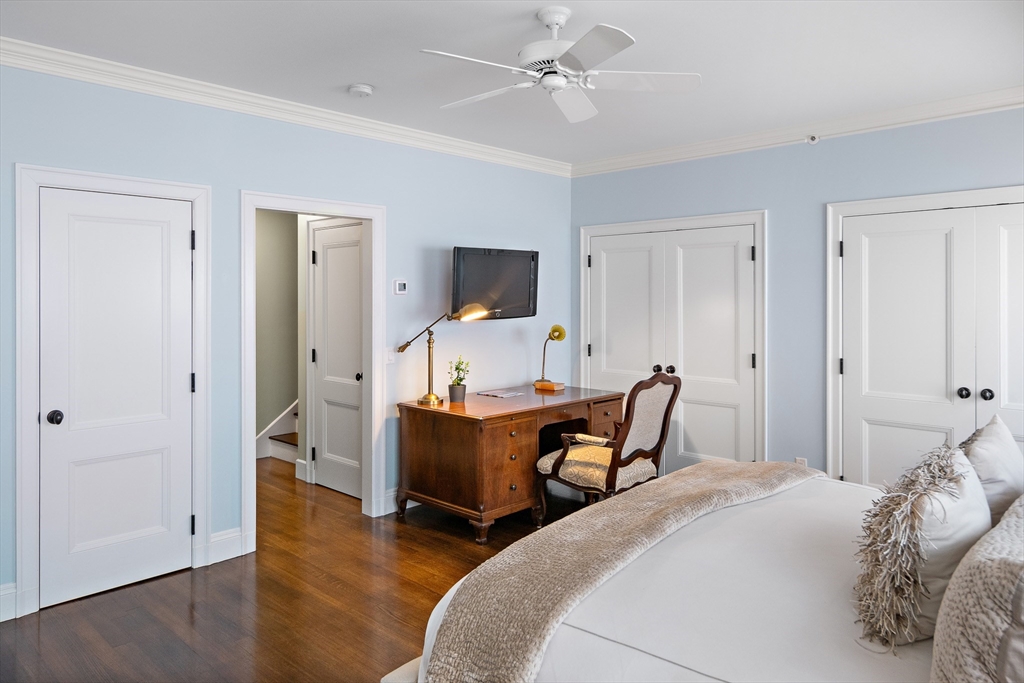 300 Boylston Street, Unit 909 Boston, MA 02116 - Photo 14 of 18 a bedroom with a bed and a desk