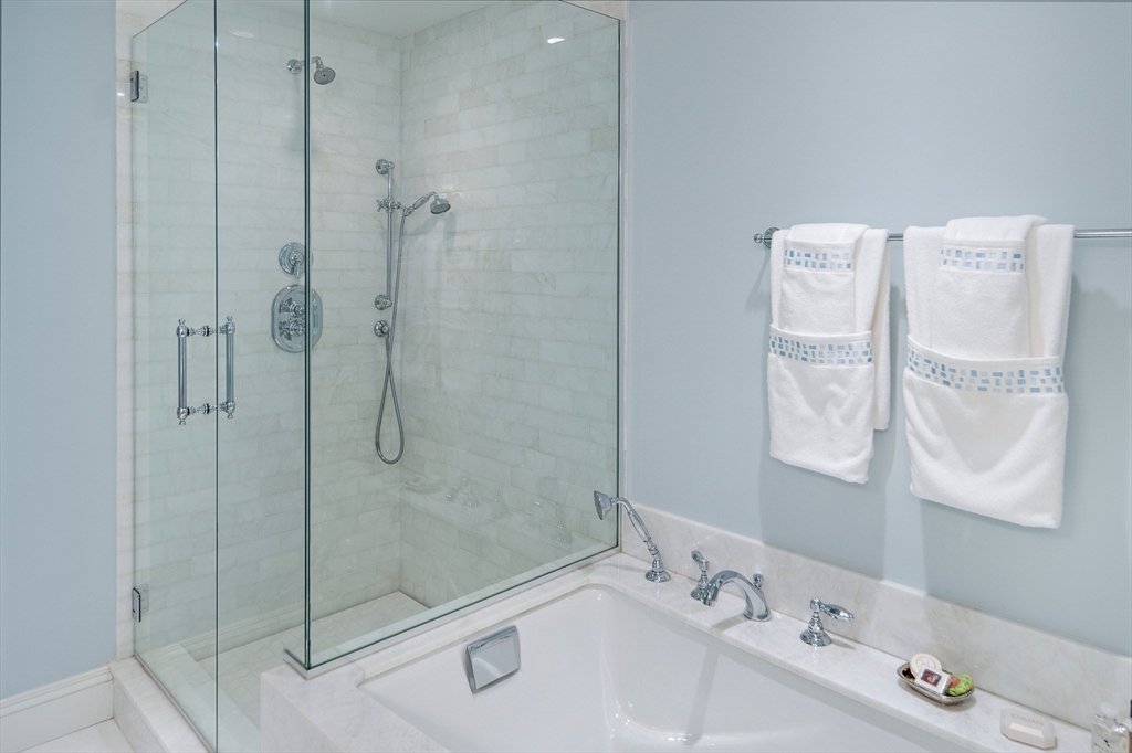 300 Boylston Street, Unit 909 Boston, MA 02116 - Photo 16 of 18 a bathroom with a sink and a shower
