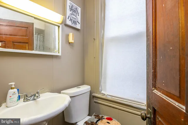 a bathroom with a sink and a toilet