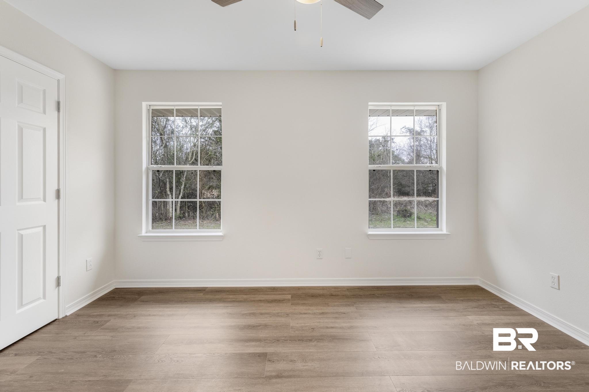 16330 Absalom Street Foley, AL 36535 - Photo 36 of 42 Spare room with ceiling fan and light hardwood / wood-style floors