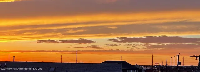 a view of a house with a ocean view
