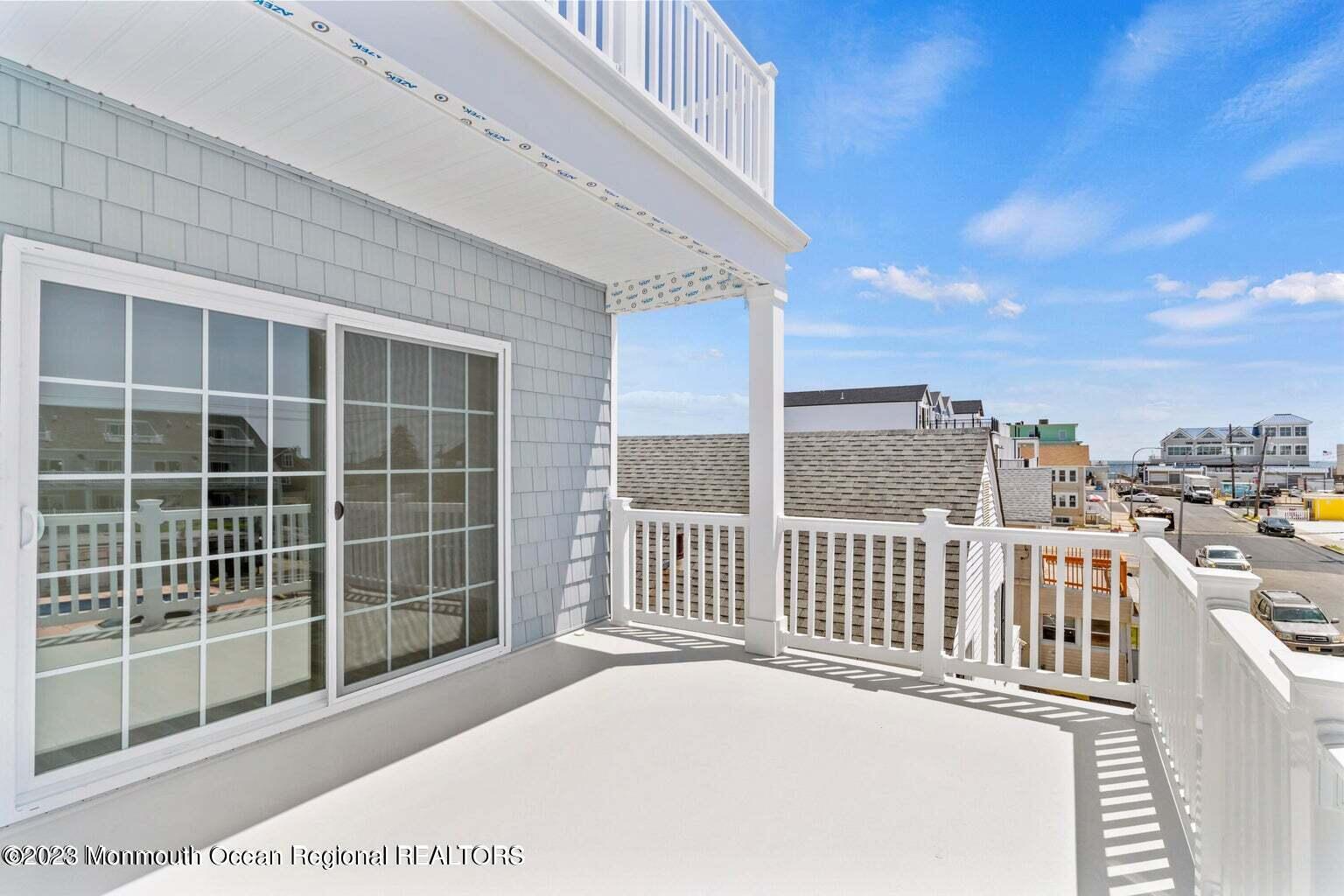 61 Hamilton Avenue Seaside Heights, NJ 08751 - Photo 27 of 31 a view of a balcony with city view