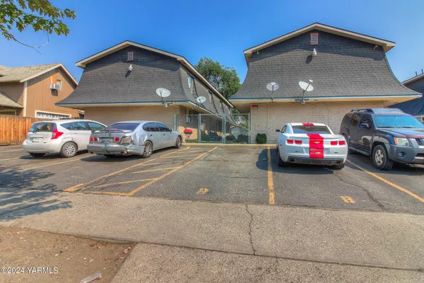 a car parked in front of garage