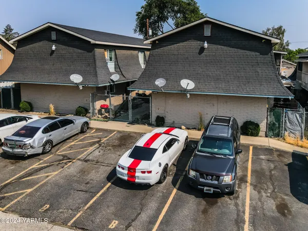 a car parked in front of a house