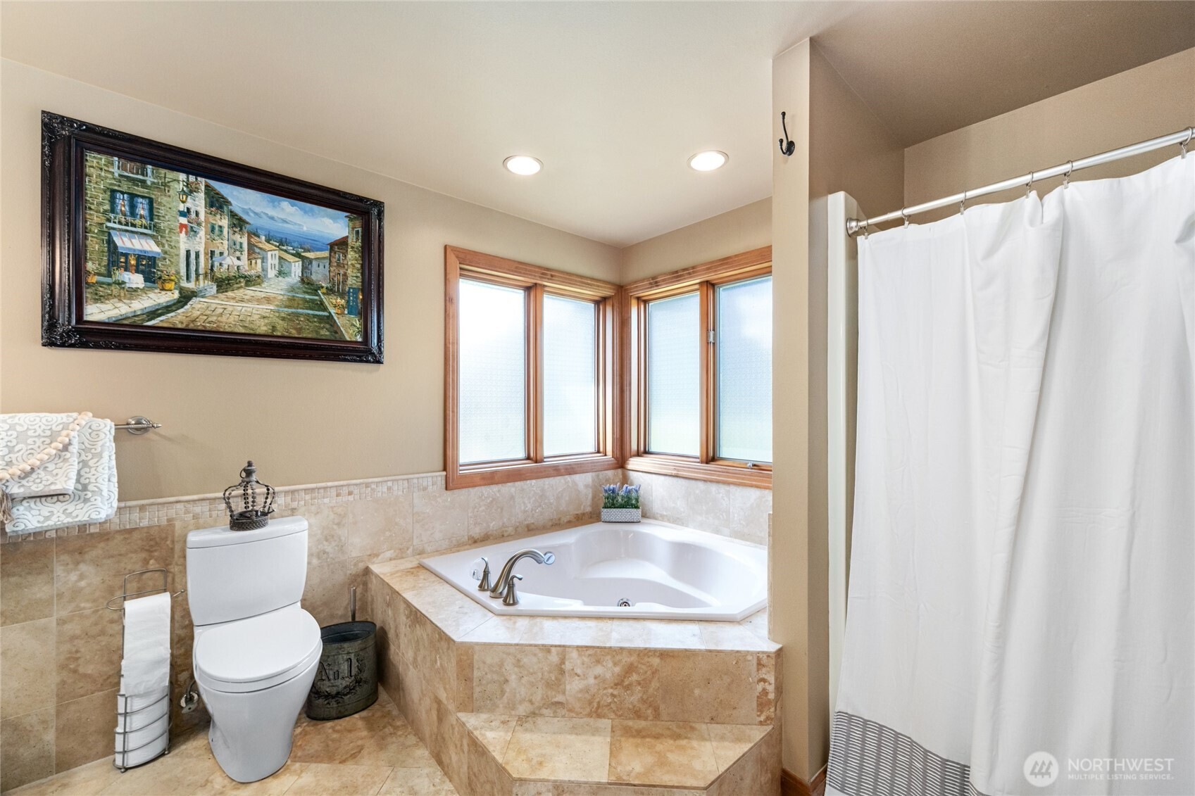 770 East Wiser Lake Road Lynden, WA 98264 - Photo 12 of 36 a bathroom with a toilet sink and tub