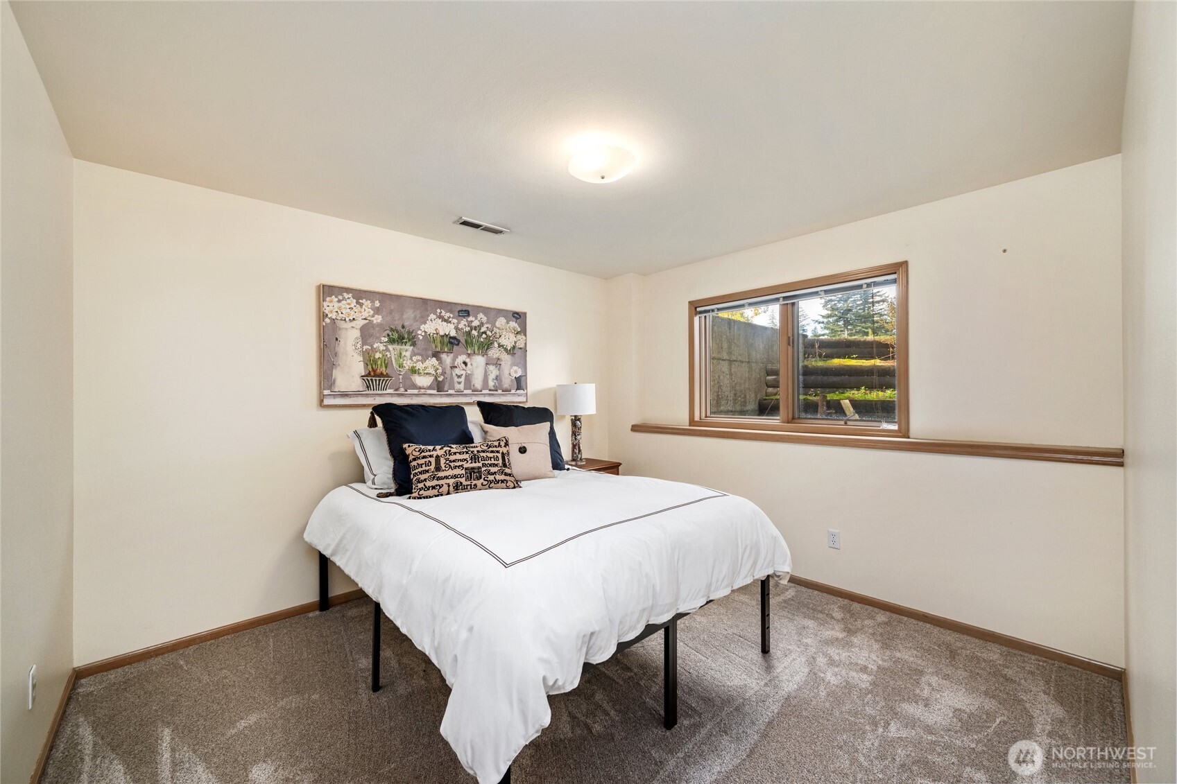 770 East Wiser Lake Road Lynden, WA 98264 - Photo 21 of 36 a bedroom with a bed and a window