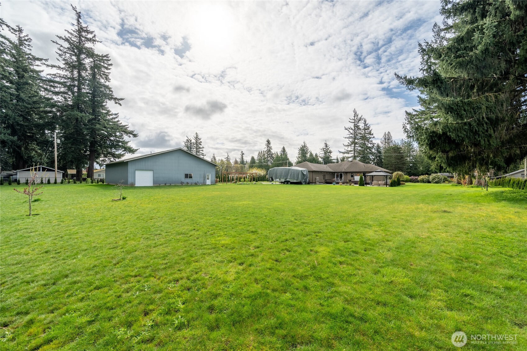 770 East Wiser Lake Road Lynden, WA 98264 - Photo 31 of 36 a view of a house with a yard