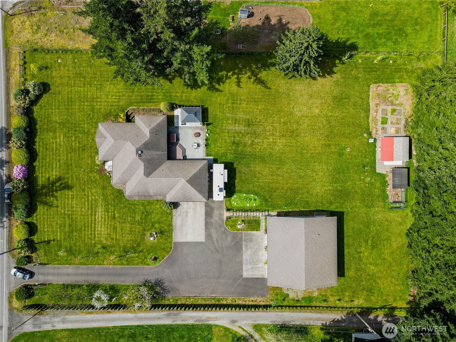 770 East Wiser Lake Road Lynden, WA 98264 - Photo 34 of 36 an aerial view of a house with a yard basket ball court and outdoor seating