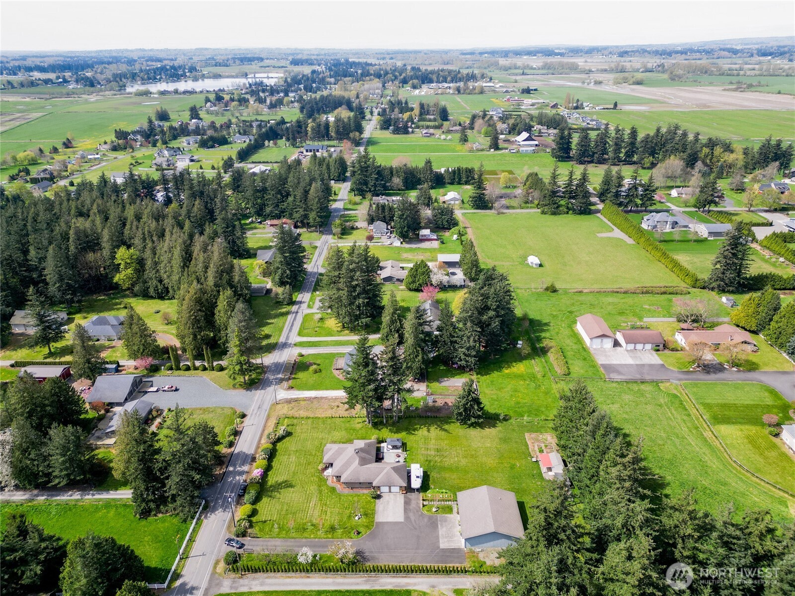 770 East Wiser Lake Road Lynden, WA 98264 - Photo 35 of 36 an aerial view of residential houses with outdoor space and trees
