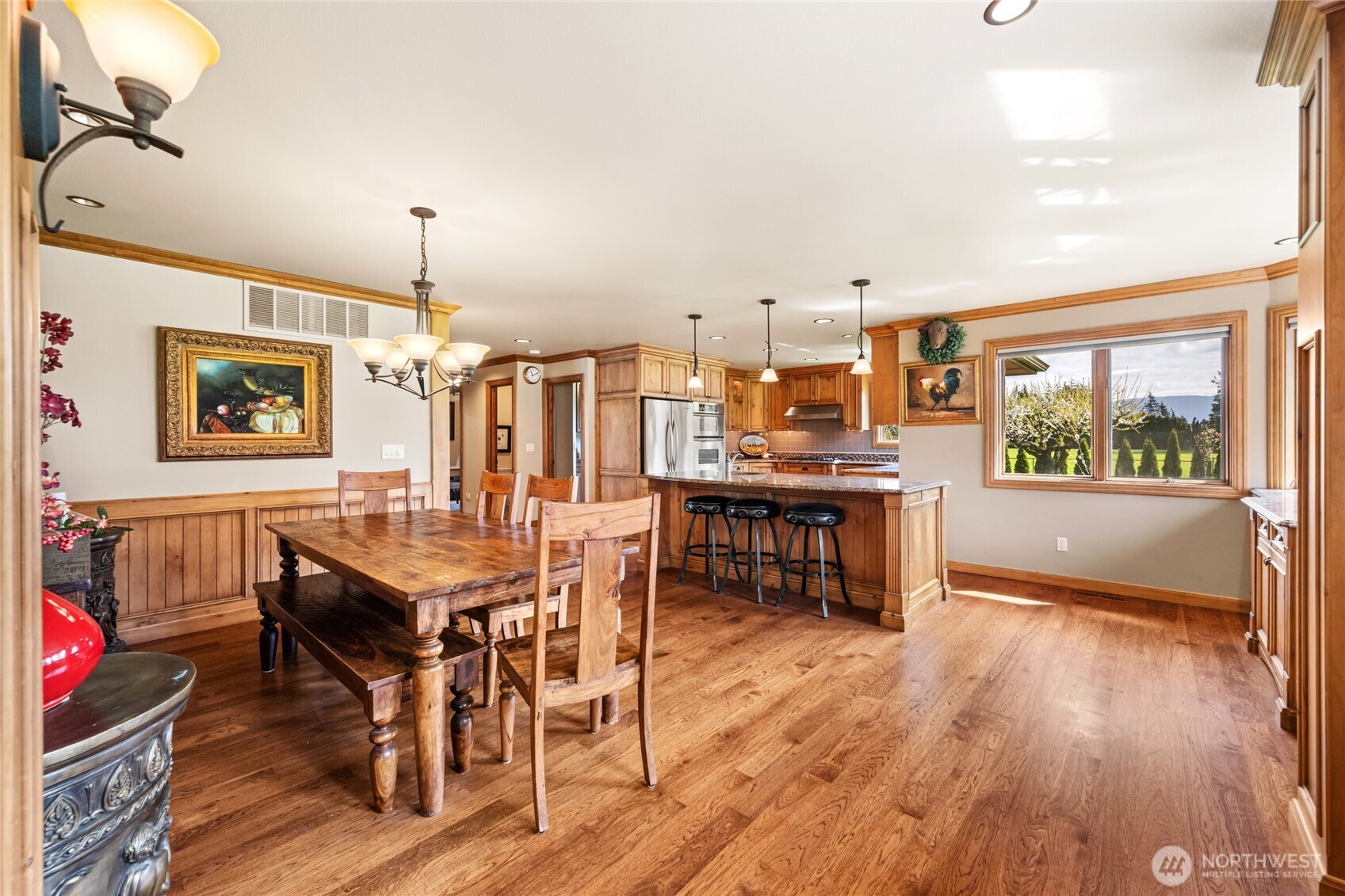 770 East Wiser Lake Road Lynden, WA 98264 - Photo 5 of 36 a view of a dining room with furniture and wooden floor
