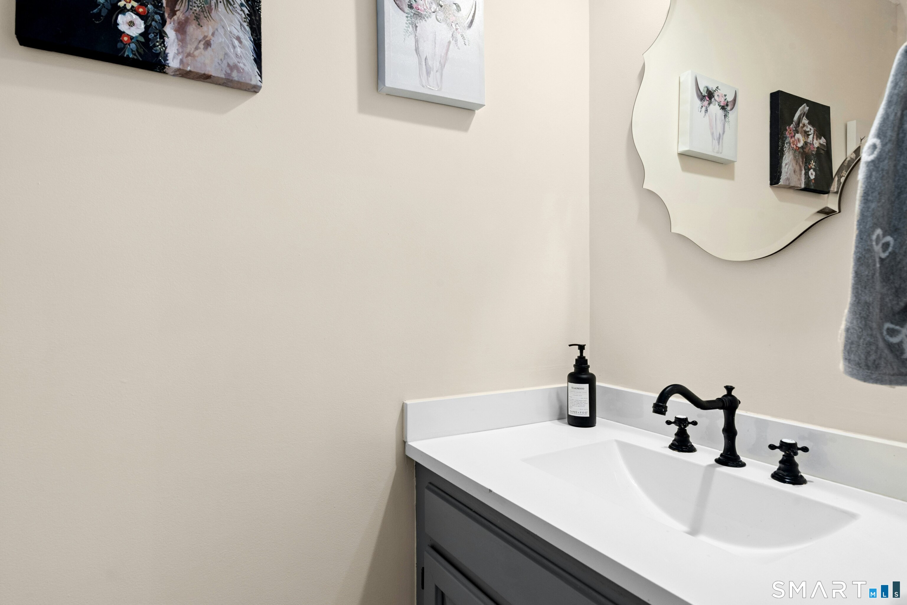 55 Mill Plain Road, Unit 193 Danbury, CT 06811 - Photo 12 of 27 a bathroom with a sink and a mirror