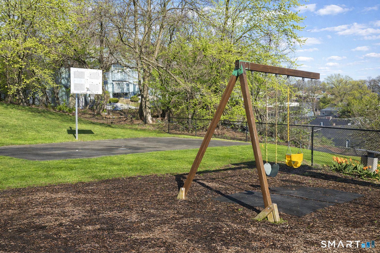 55 Mill Plain Road, Unit 193 Danbury, CT 06811 - Photo 26 of 27 a view of a park with a slide