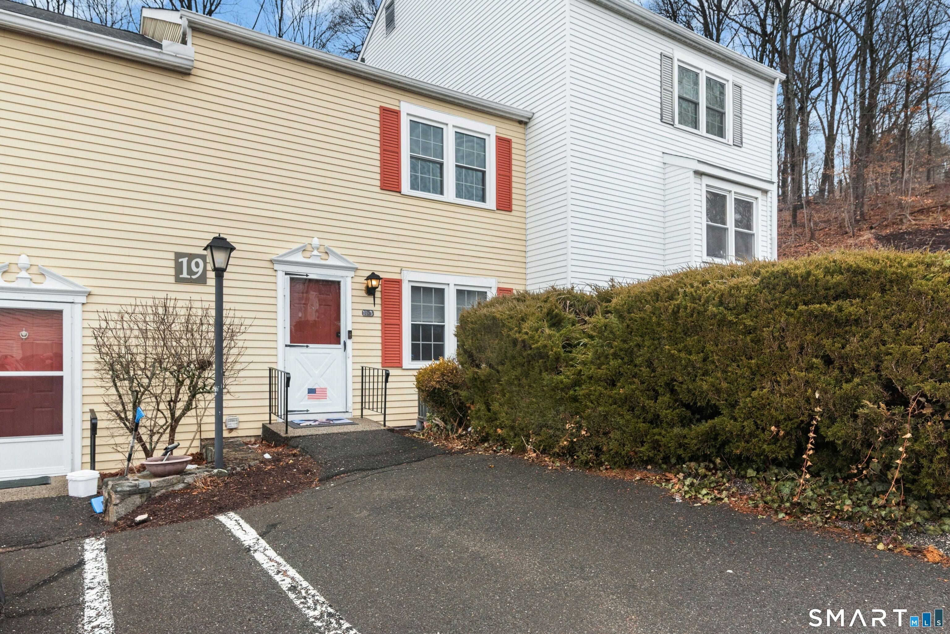 55 Mill Plain Road, Unit 193 Danbury, CT 06811 - Photo 3 of 27 a view of a house with a street