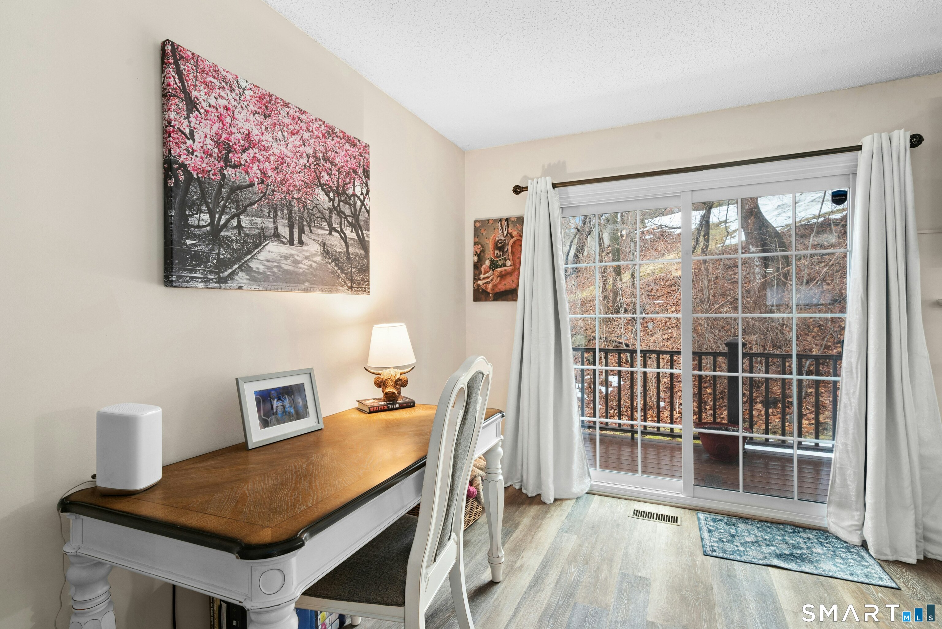 55 Mill Plain Road, Unit 193 Danbury, CT 06811 - Photo 8 of 27 a view of a workspace with furniture and a window