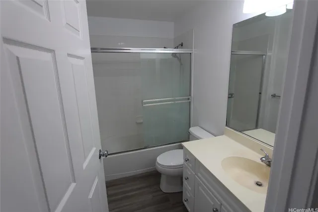 a bathroom with a sink and toilet