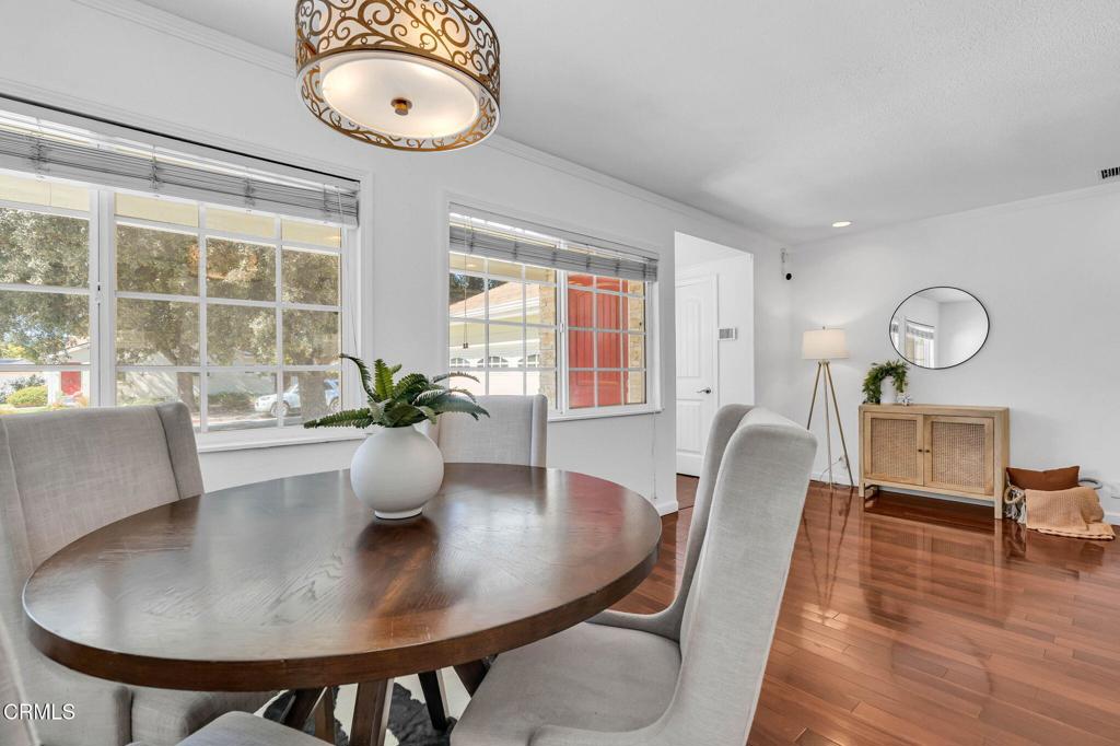 472 Geneva Avenue Claremont, CA 91711 - Photo 13 of 50 a view of a dining room with furniture window and wooden floor
