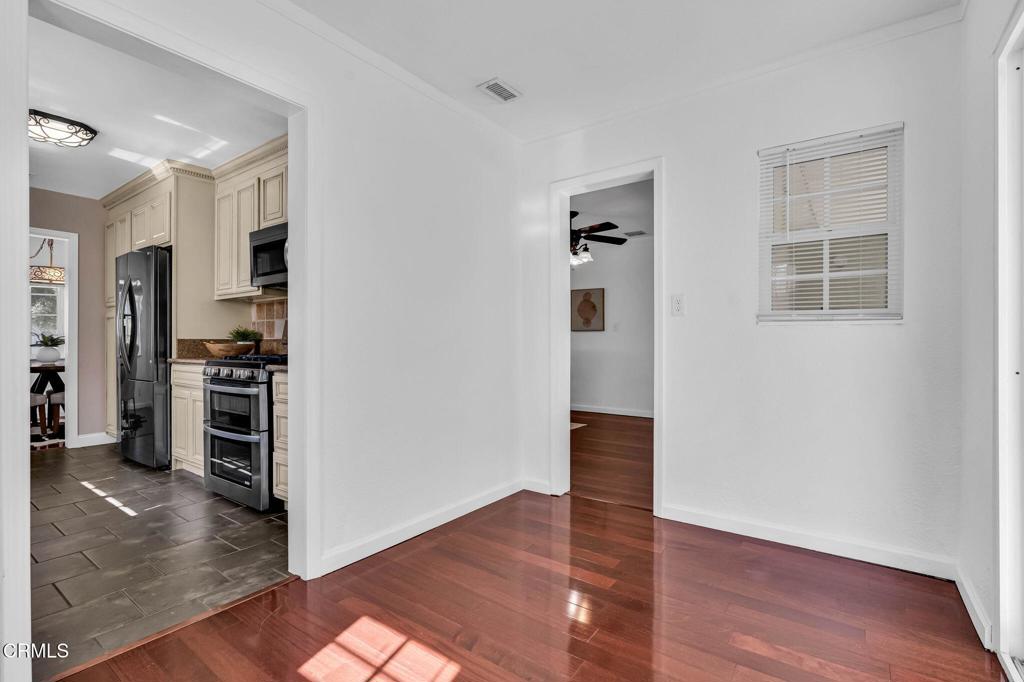 472 Geneva Avenue Claremont, CA 91711 - Photo 21 of 50 a view of a kitchen with wooden floor and a window