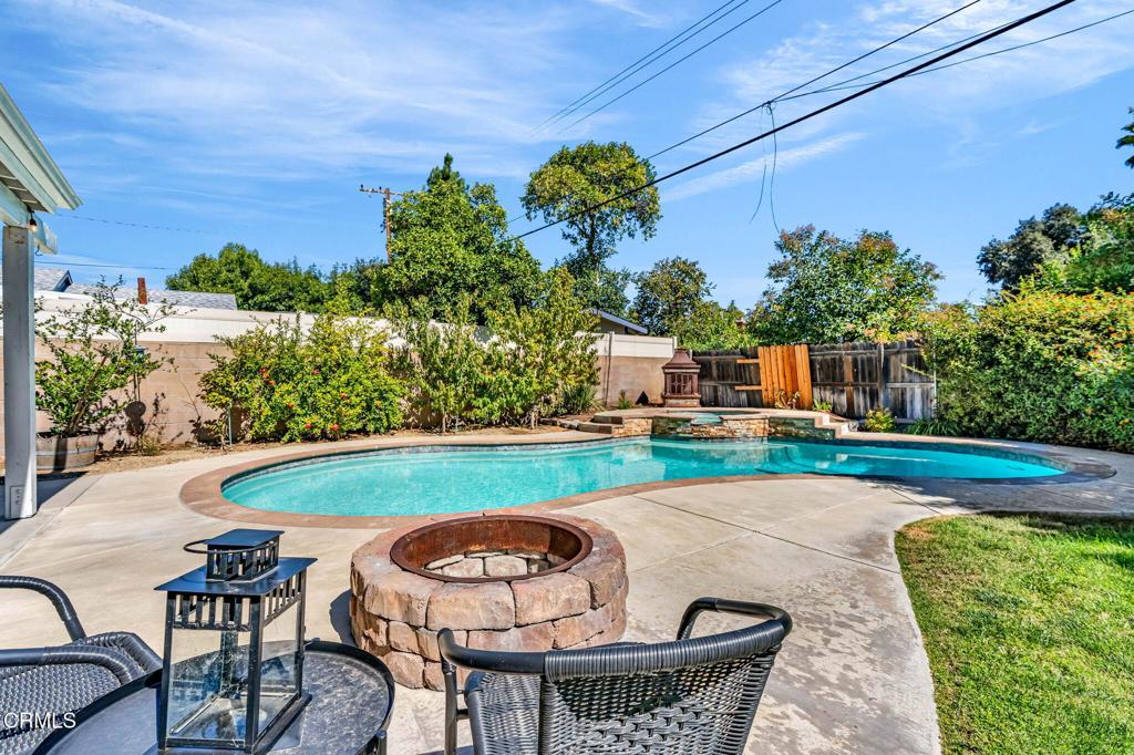 472 Geneva Avenue Claremont, CA 91711 - Photo 39 of 50 a view of a swimming pool with a patio