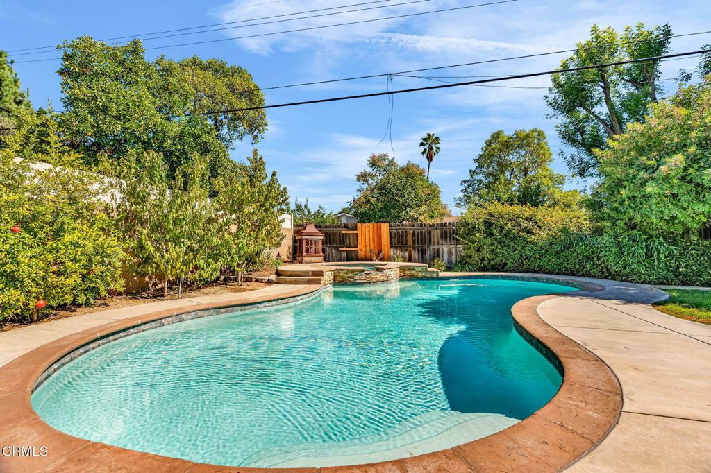 472 Geneva Avenue Claremont, CA 91711 - Photo 41 of 50 a view of a swimming pool with a outdoor seating area