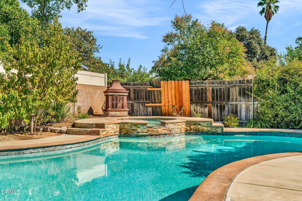 472 Geneva Avenue Claremont, CA 91711 - Photo 46 of 50 a view of a house with swimming pool and a yard