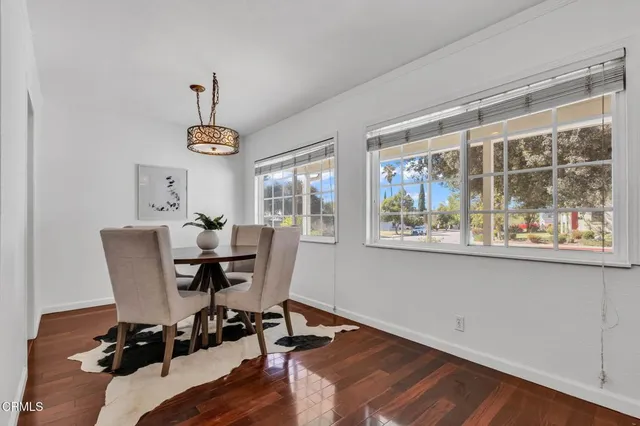 a workspace with furniture window and outside view