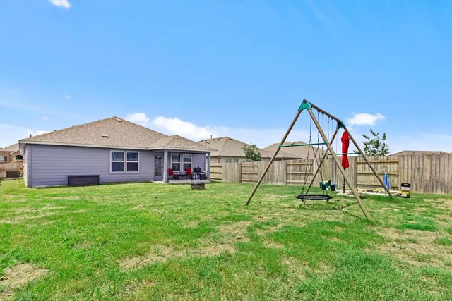 an aerial view of a city with lots of residential buildings