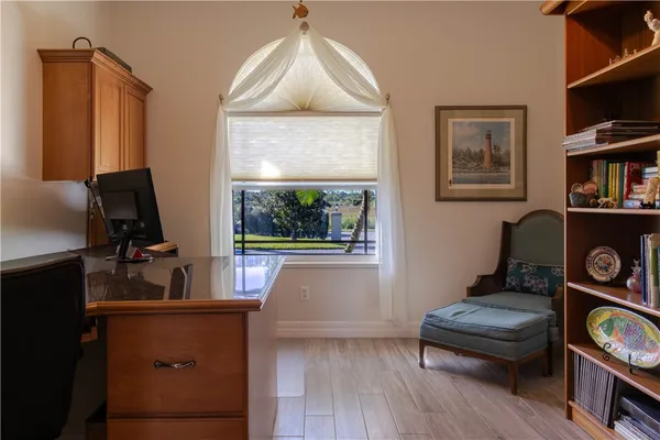 a bathroom with a sink mirror vanity and toilet