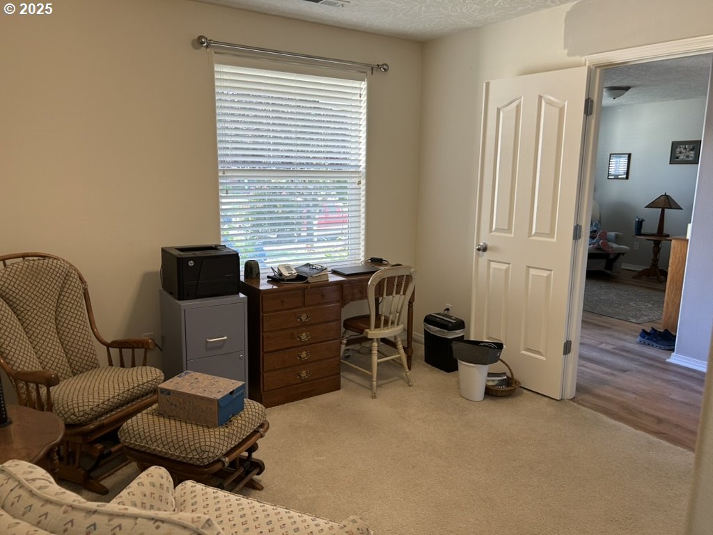 736 Kelsey Loop Molalla, OR 97038 - Photo 17 of 21 a view of a workspace with furniture and a window
