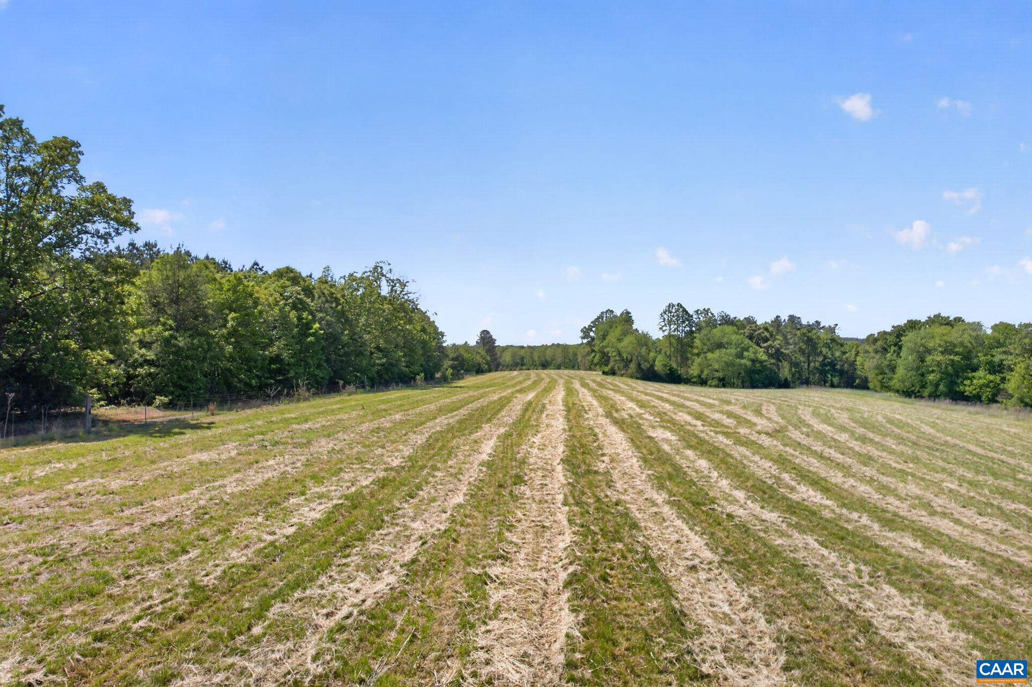 Lot 5 Shores Road Palmyra, VA 22963 - Photo 3 of 11 a view of a yard with an outdoor space and seating area