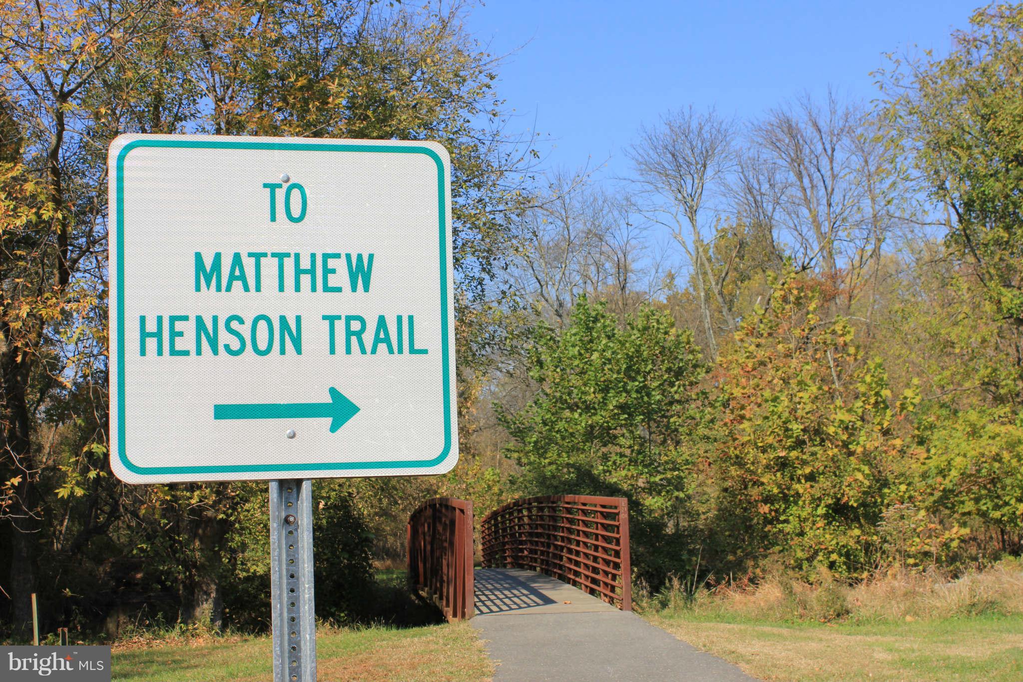 12107 Dewey Road Silver Spring, MD 20906 - Photo 22 of 30 a sign board with tall trees