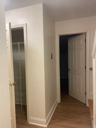 wooden floor and closet in a gallery