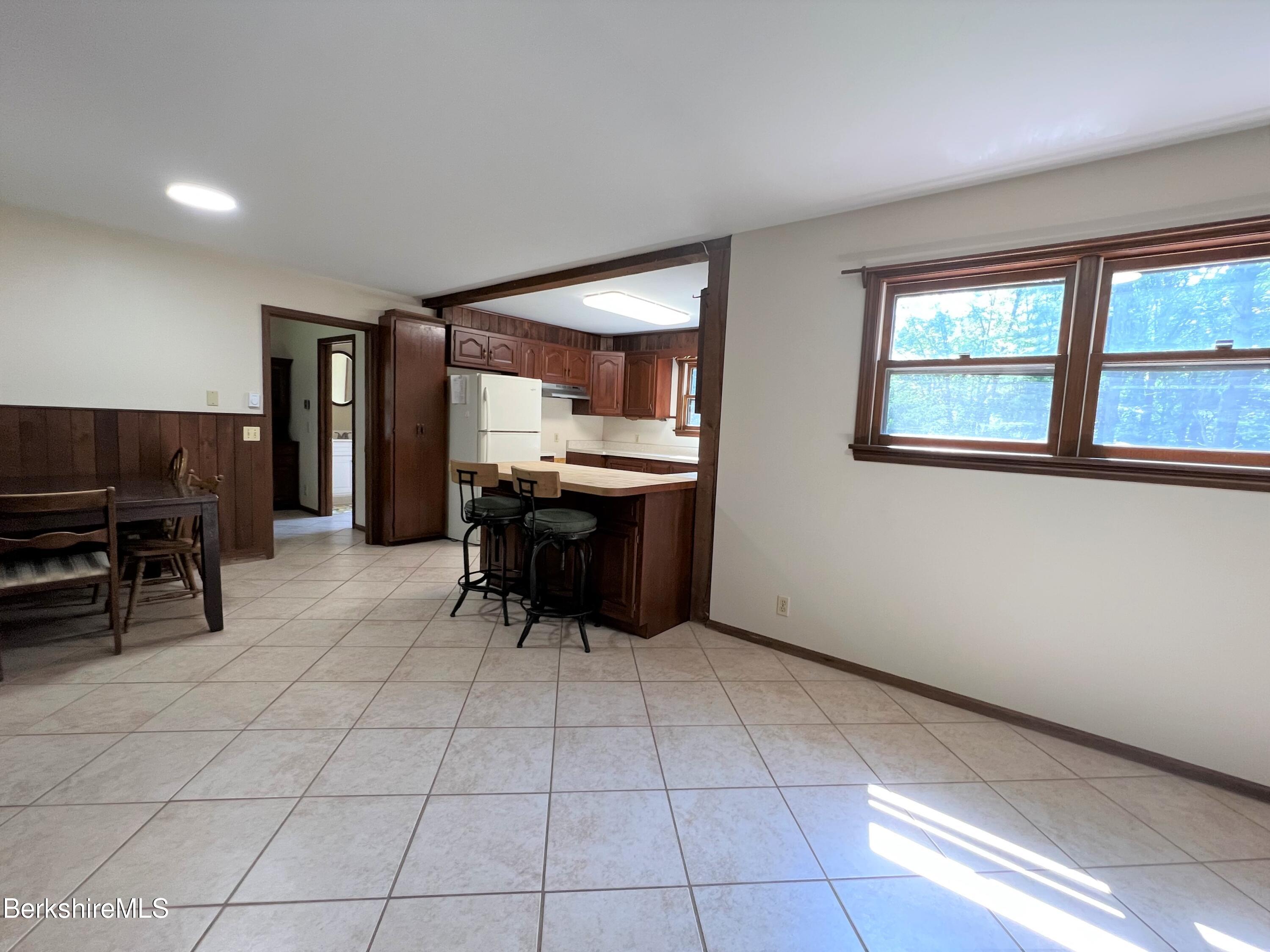 280 Middlefield Road Washington, MA 01223 - Photo 13 of 28 a view of kitchen with furniture and window