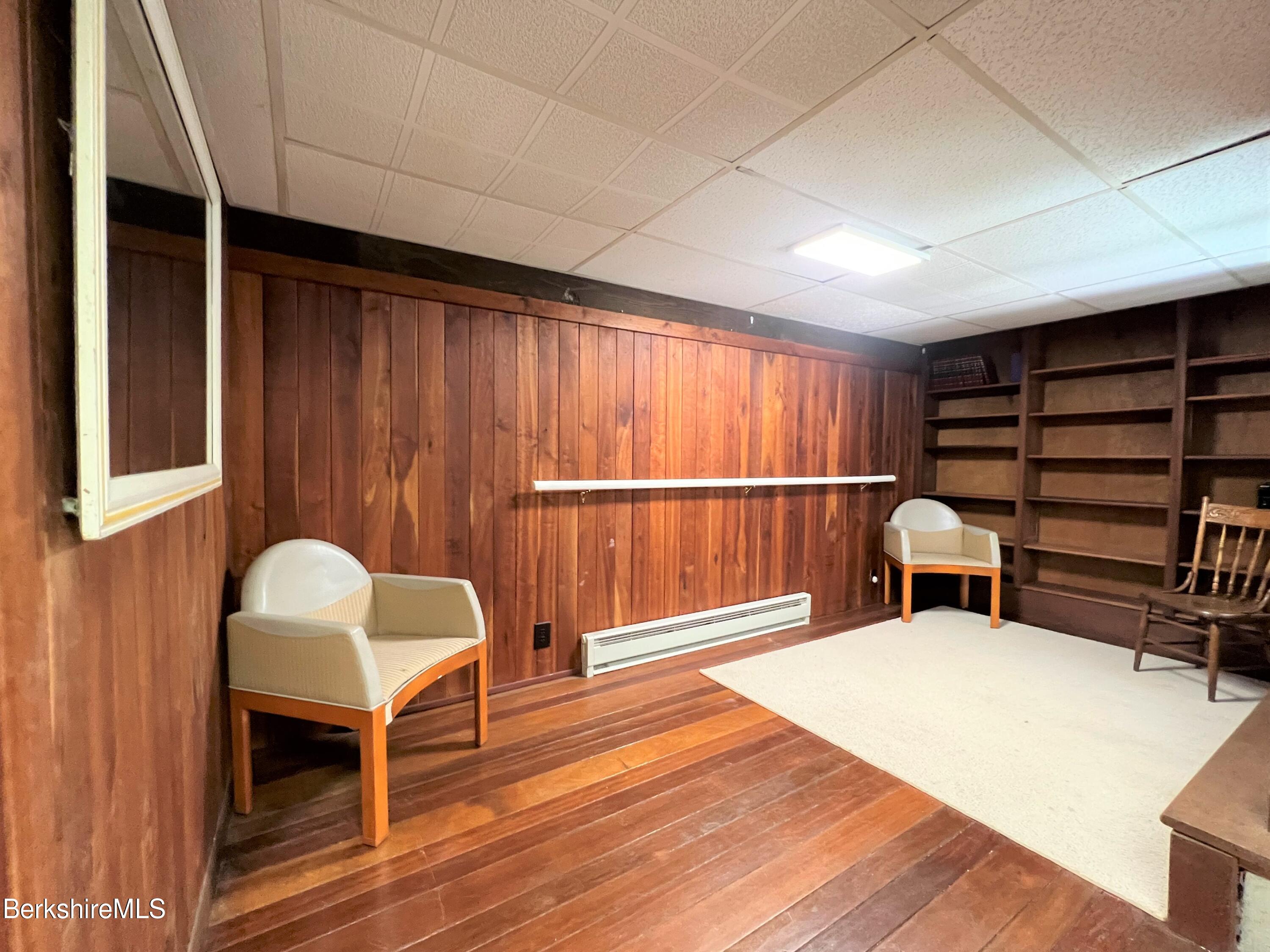 280 Middlefield Road Washington, MA 01223 - Photo 25 of 28 a bedroom with furniture and wooden floor