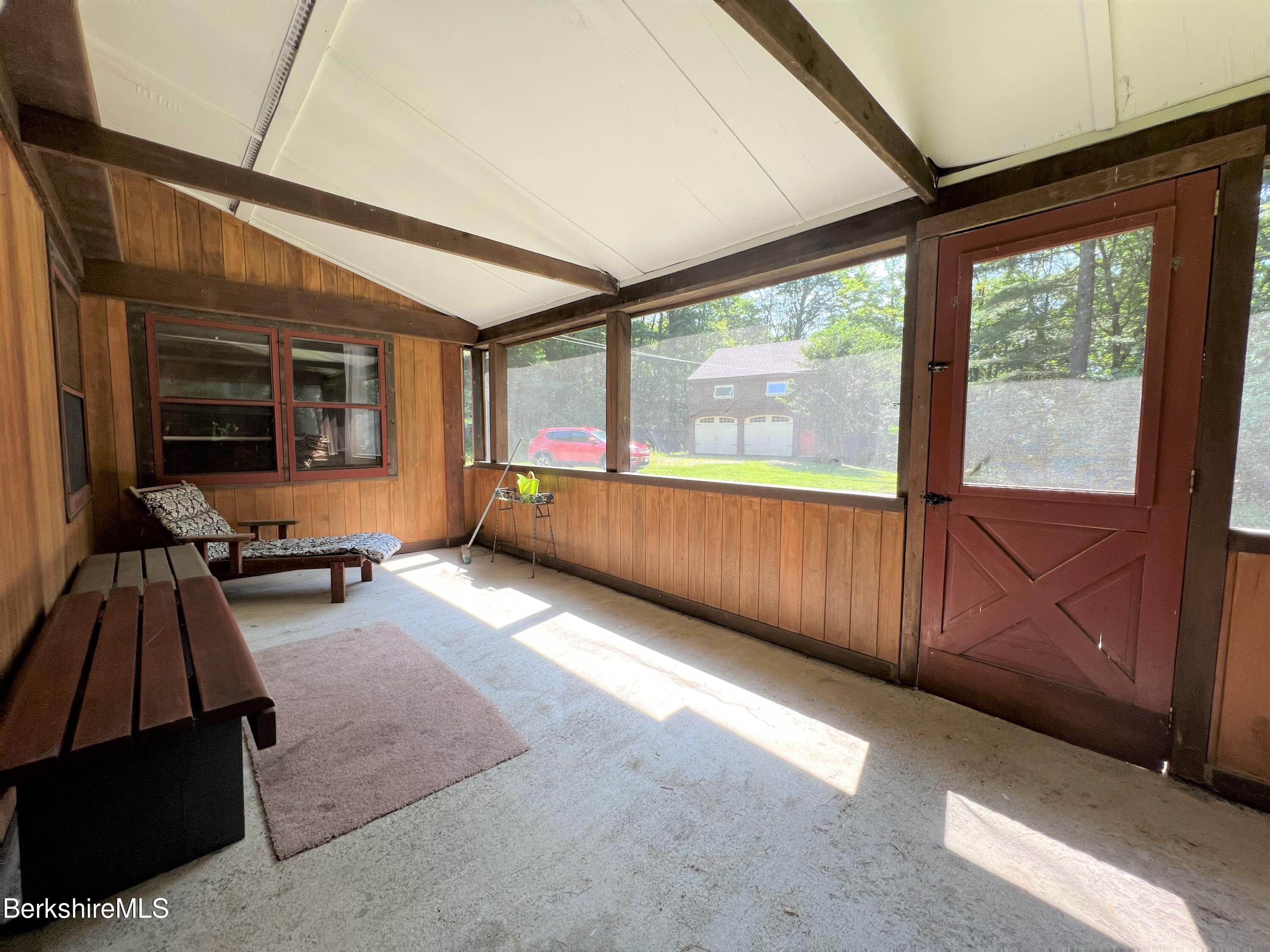 280 Middlefield Road Washington, MA 01223 - Photo 27 of 28 a view of an empty room with furniture and windows