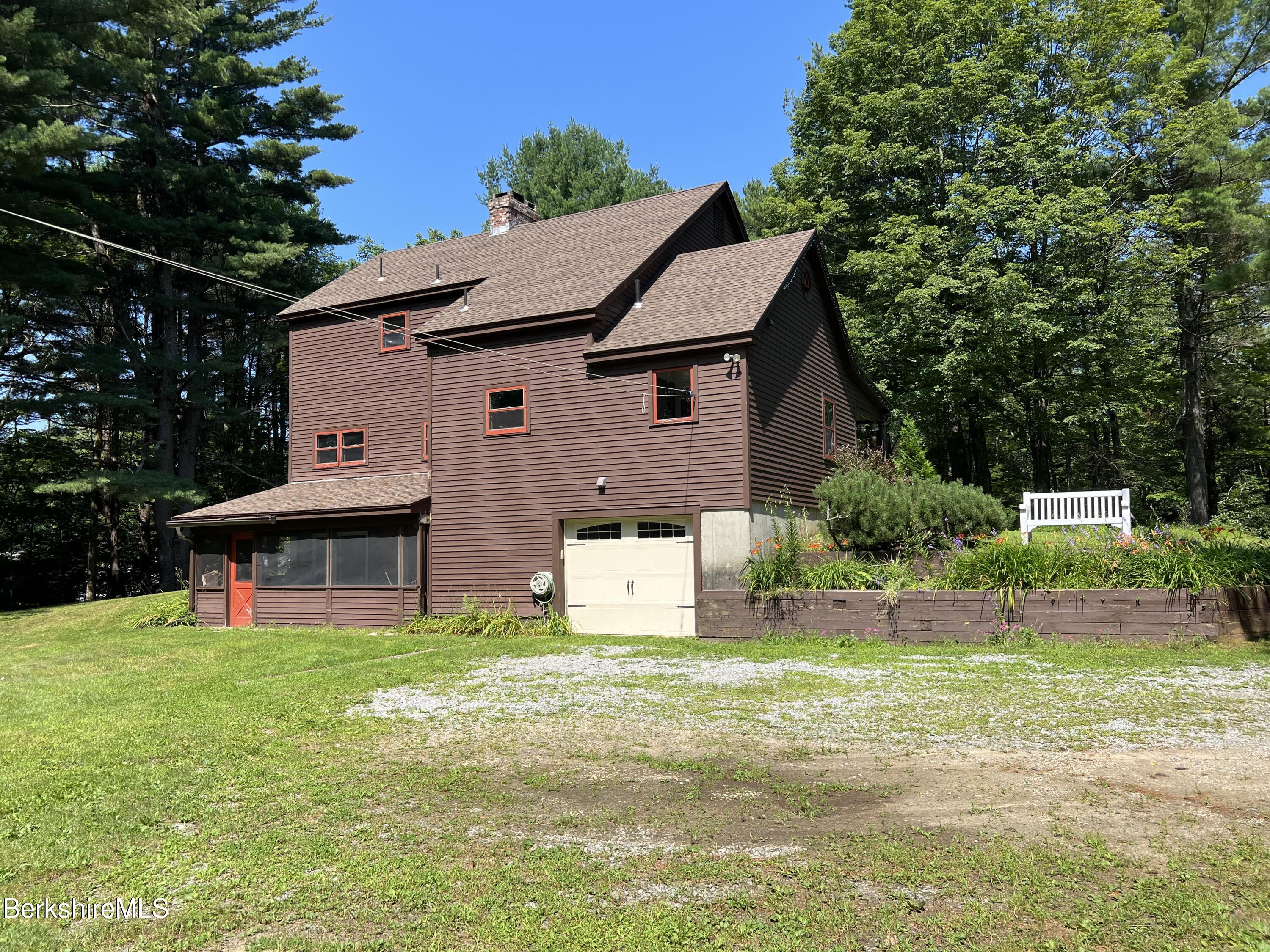 280 Middlefield Road Washington, MA 01223 - Photo 28 of 28 a front view of a house with garden