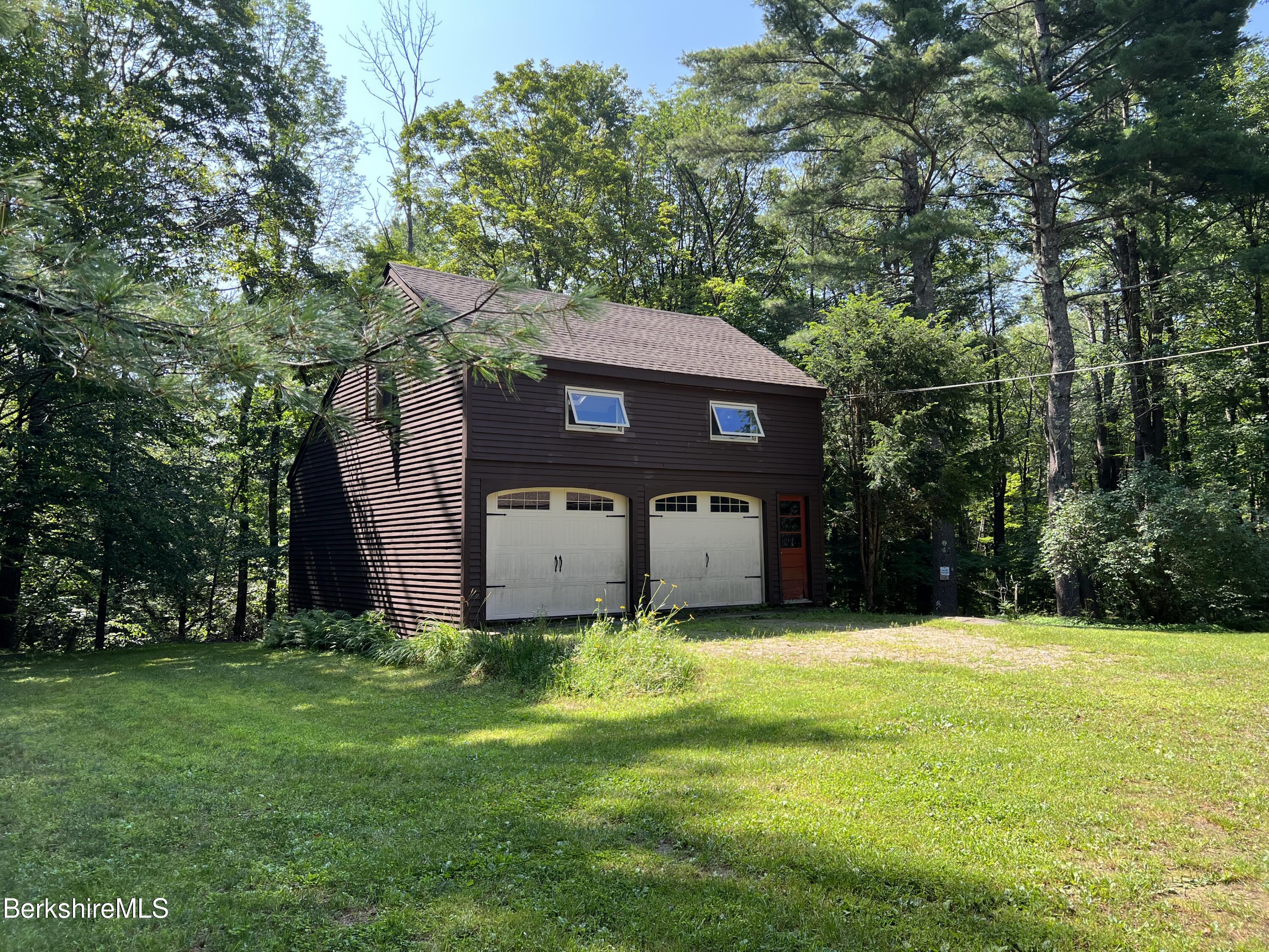 280 Middlefield Road Washington, MA 01223 - Photo 3 of 28 a view of a house with a yard