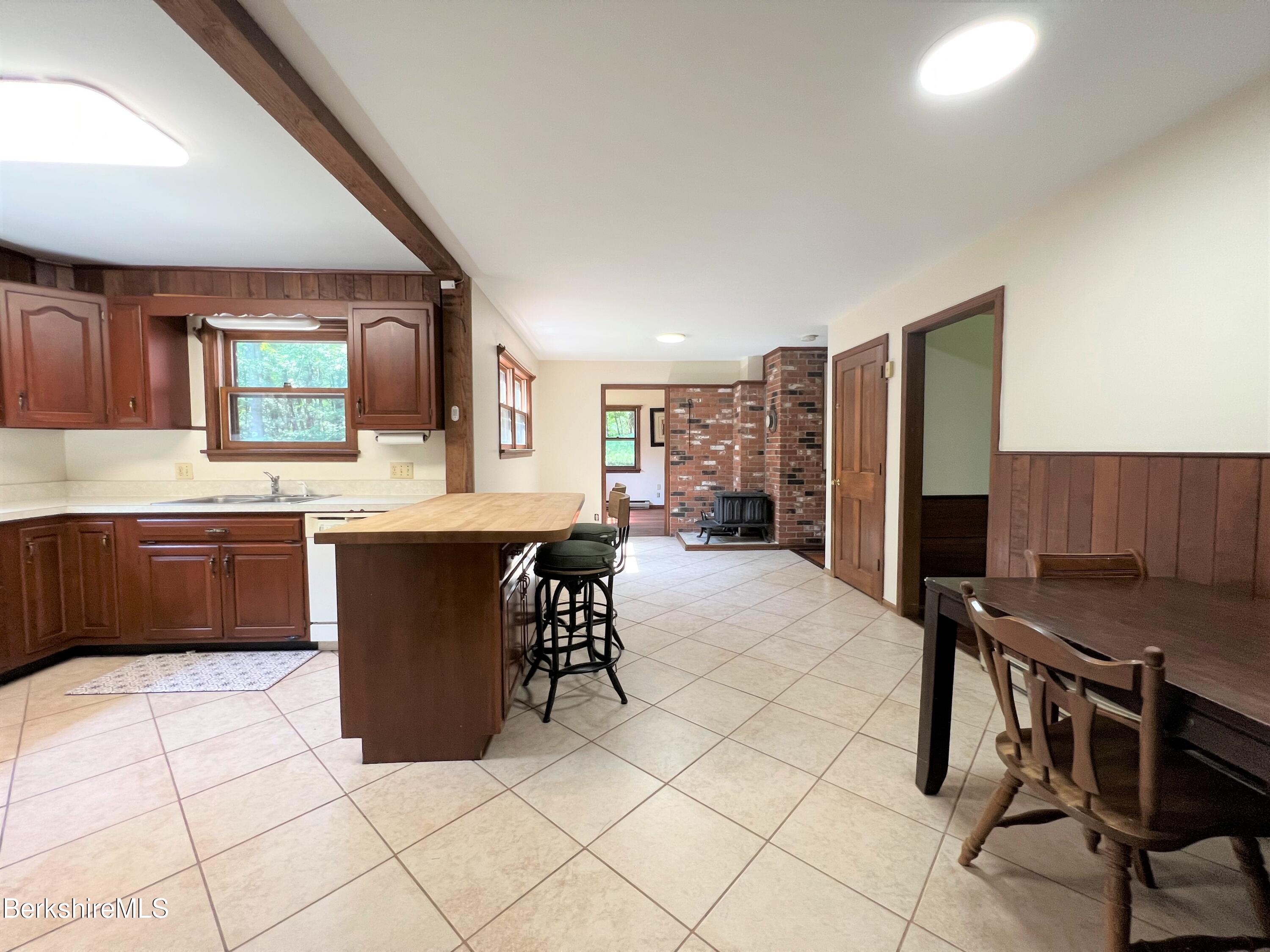 280 Middlefield Road Washington, MA 01223 - Photo 10 of 28 a view of kitchen with furniture and window
