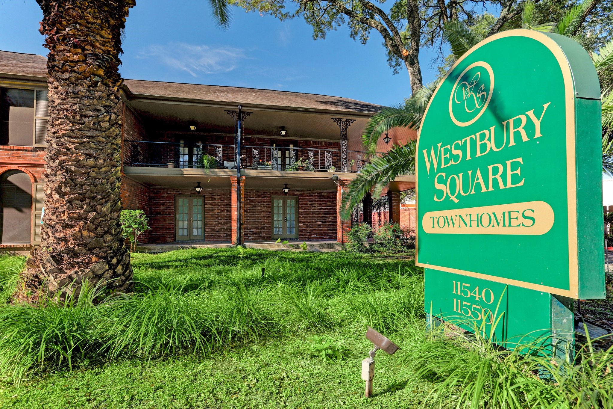 11540 Chimney Rock Road, Unit 128 Houston, TX 77035 - Photo 14 of 14 a sign that is on a brick building